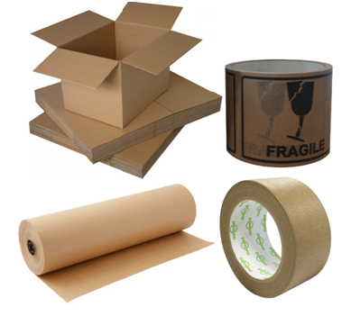 Cardboard boxes, tape, and paper with a 'Fragile' label on a white background